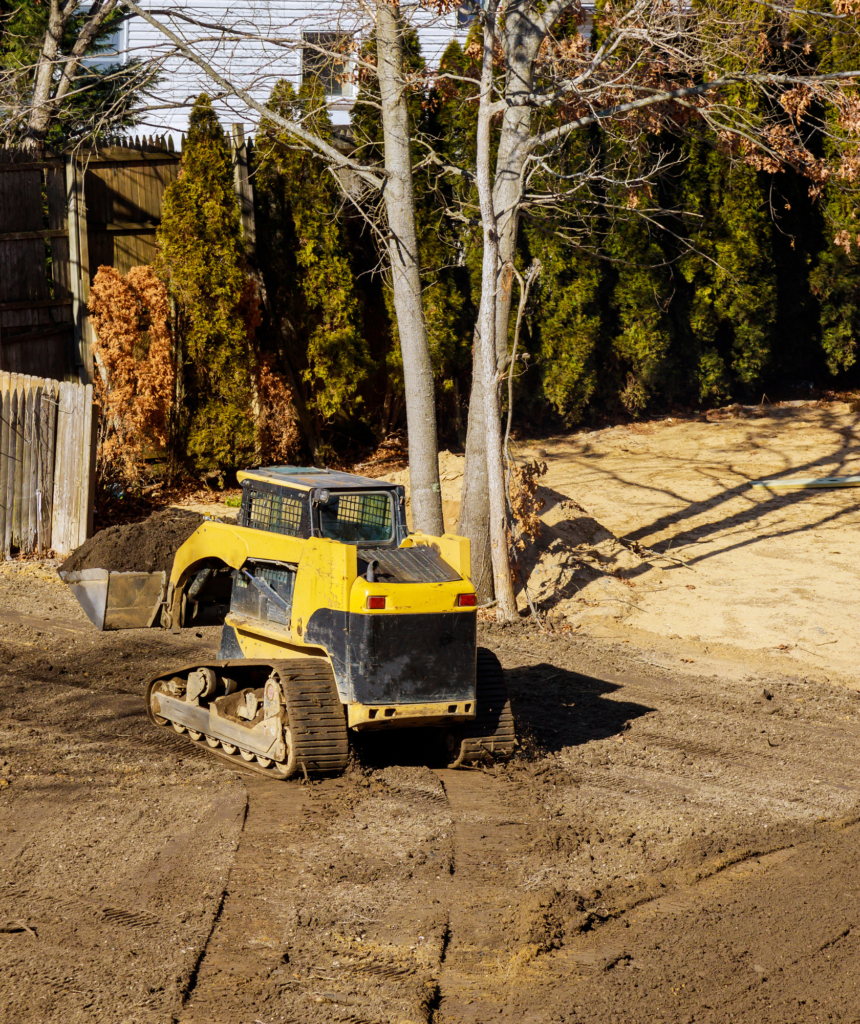 Skid Steer Loader Clearing Land for New Construction